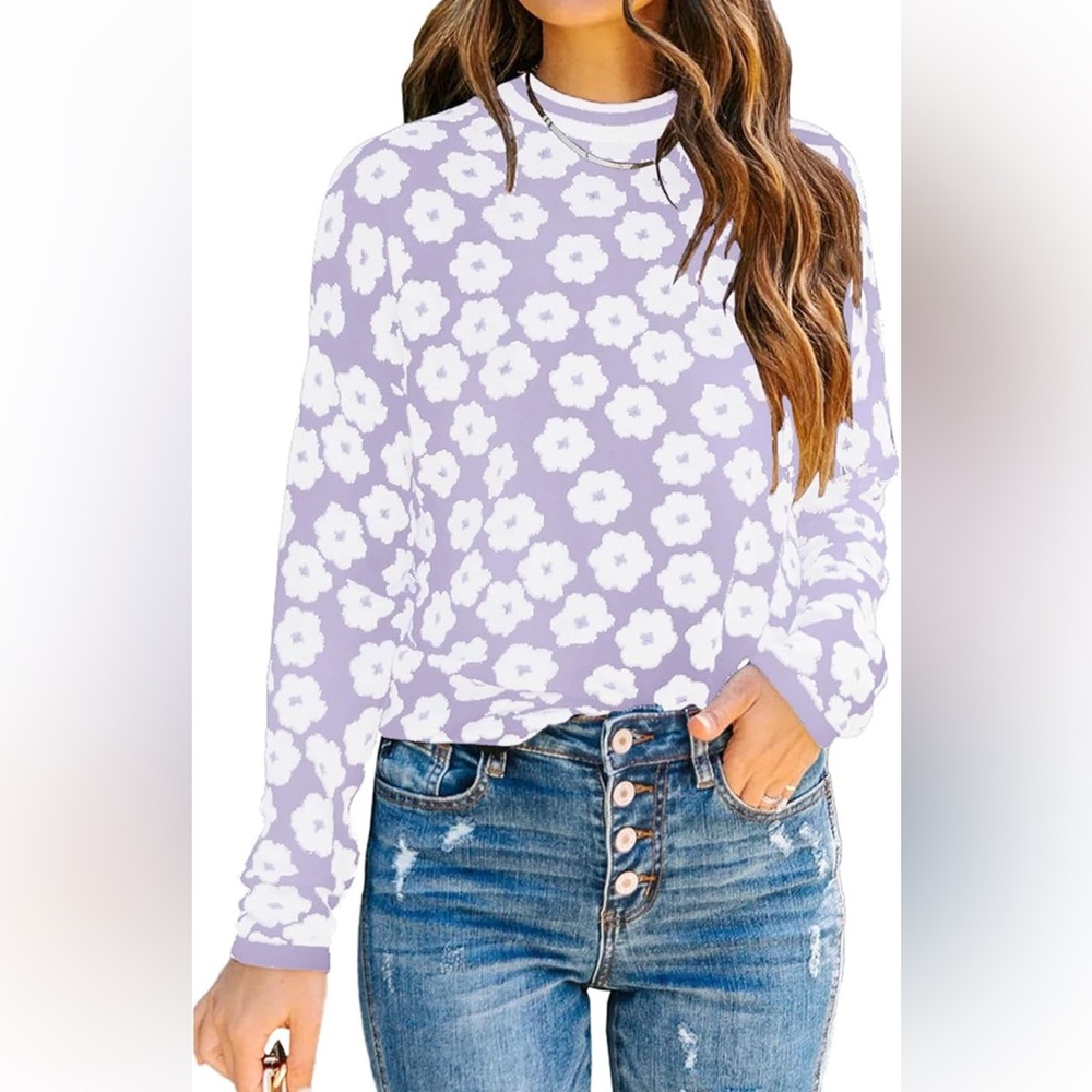 Light purple pull on sweater with white flowers